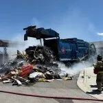 Garbage fire briefly closes Highland Drive