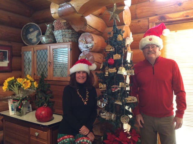 Sue and John Gleason with their Park City Christmas ornament tree