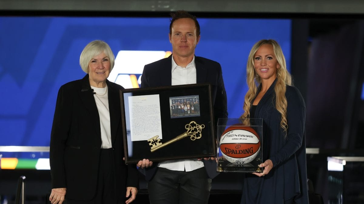 Gail Miller, Ryan Smith, and his wife Ashley Smith at a press conference in October where they were announced as the new owners of the Utah Jazz.