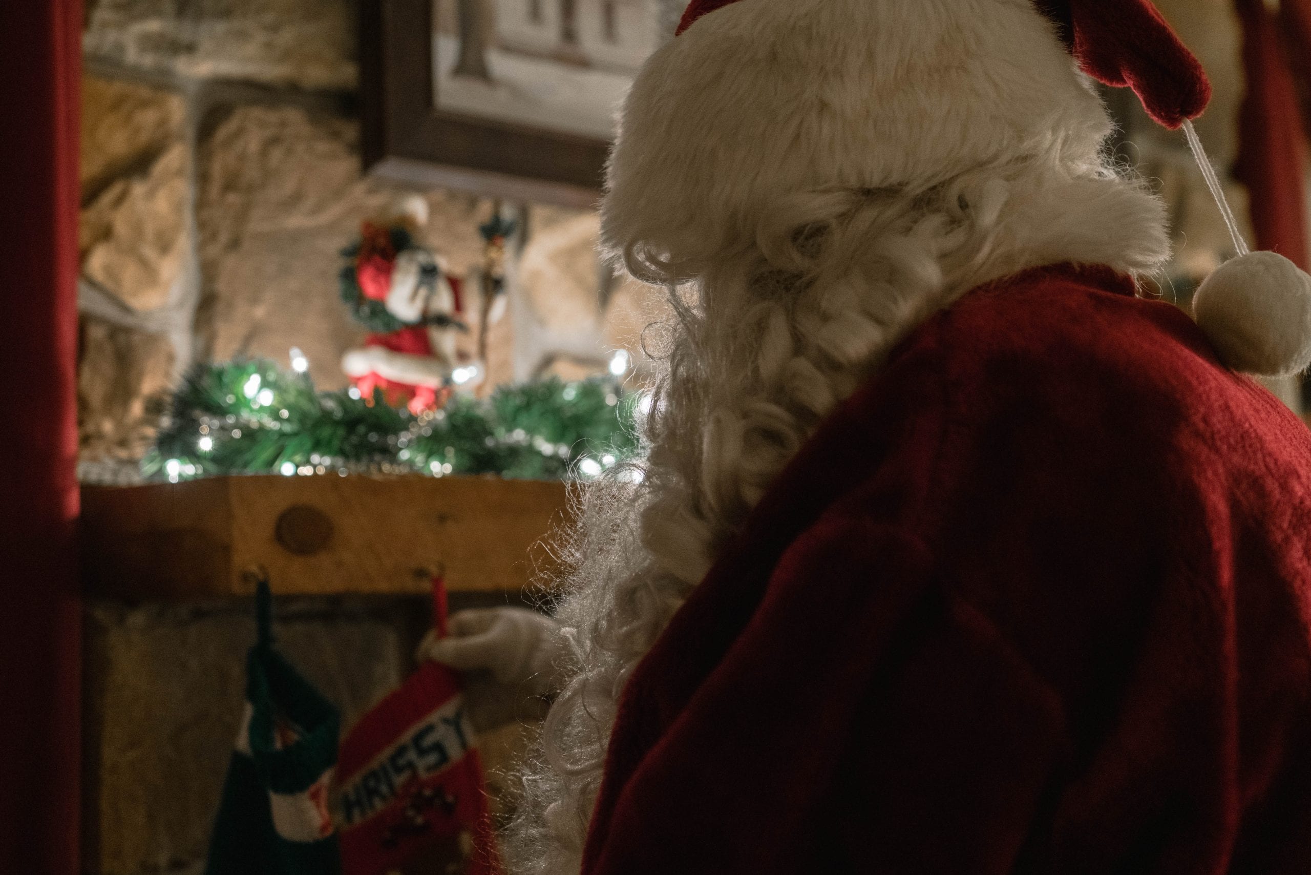 Santa Claus hanging stockings.