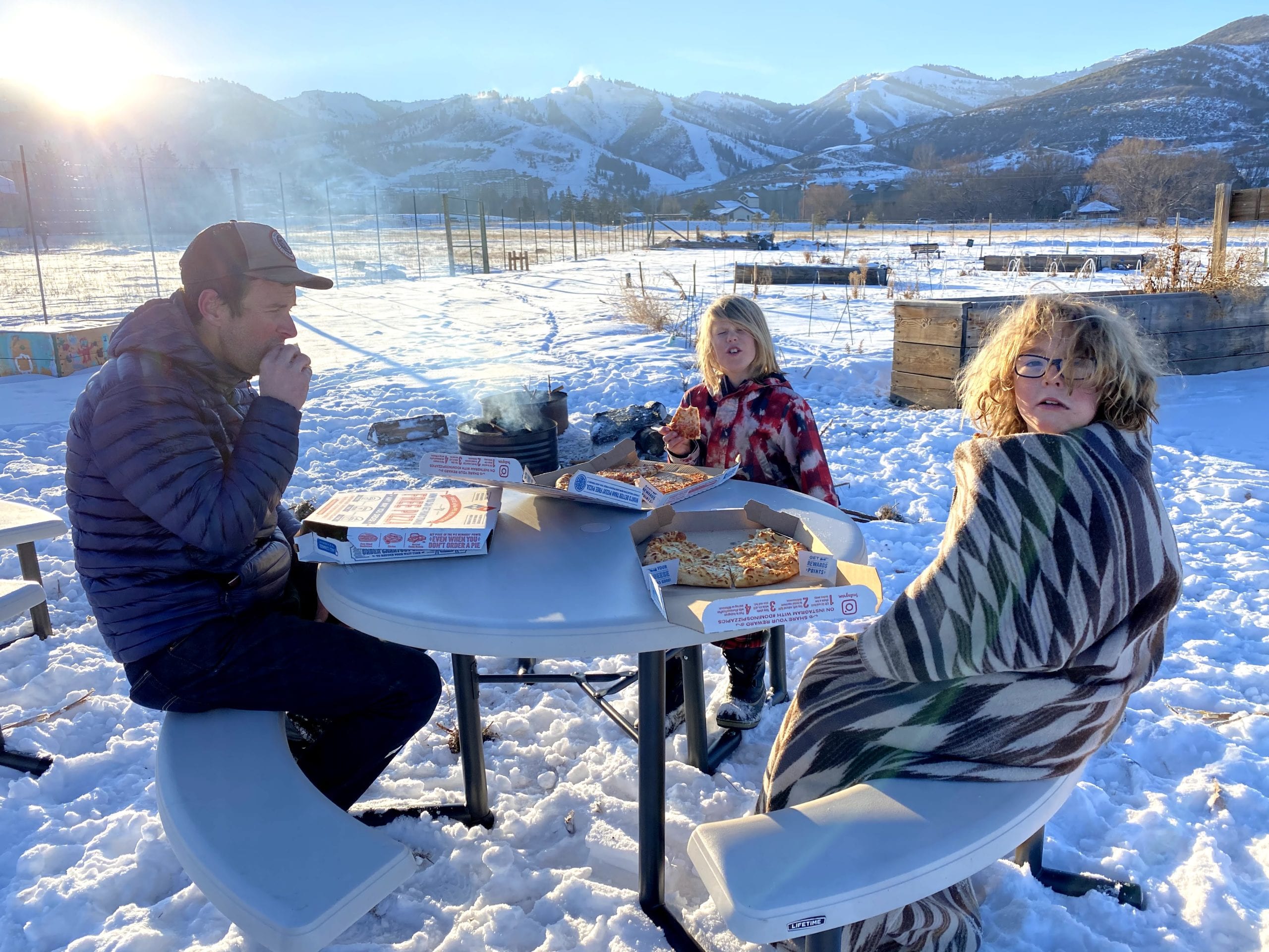 Volunteers enjoy the new tables at Summit Community Gardens // Photo courtesy of Sloane Johnson