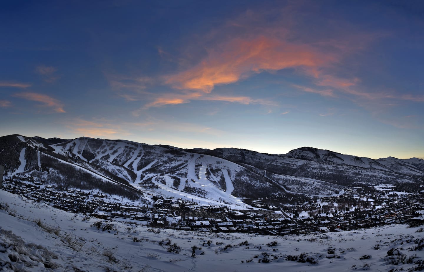 Park City tucked in beneith its snow capped mountain backdrop