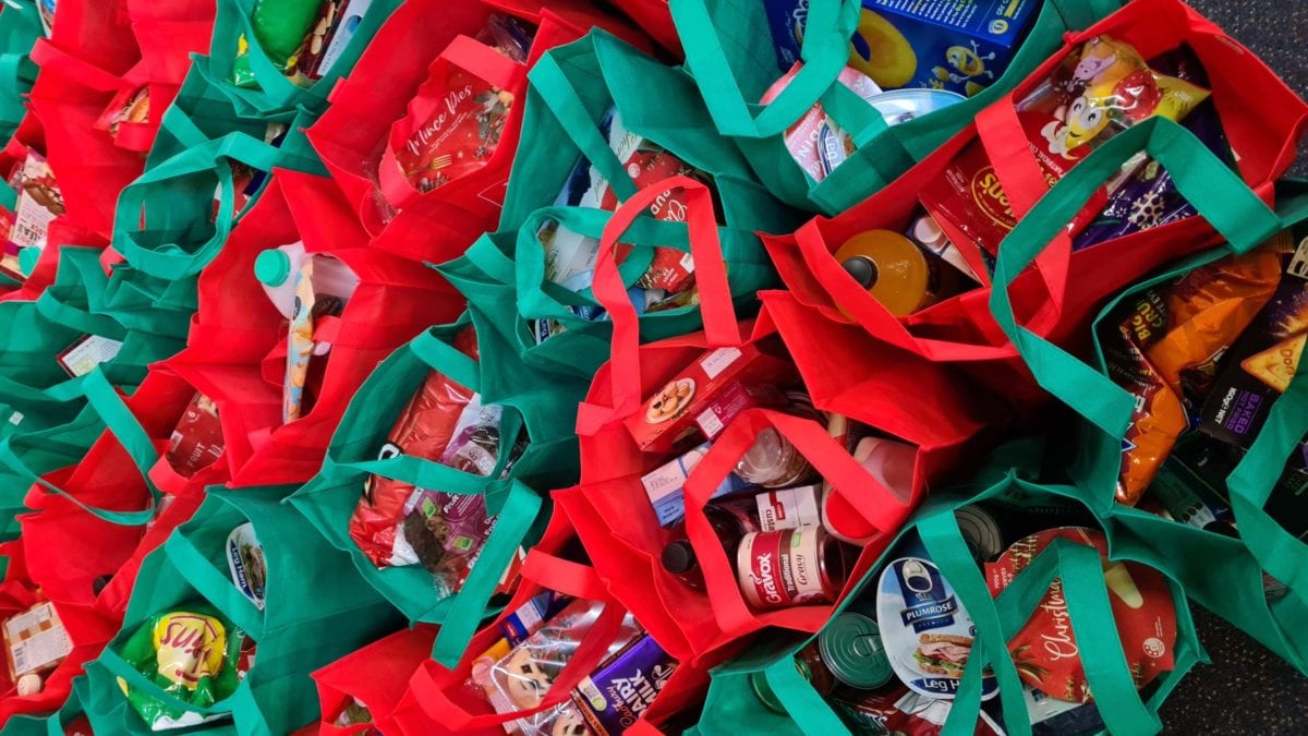 Food collected in reusable bags for donation.