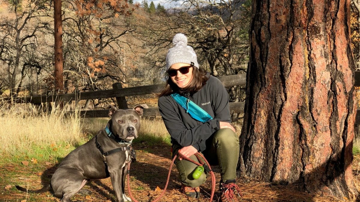 Emily Quinton, Summit County's new sustainability program manager, at the Columbia Gorge in Oregon with her four-legged friend.