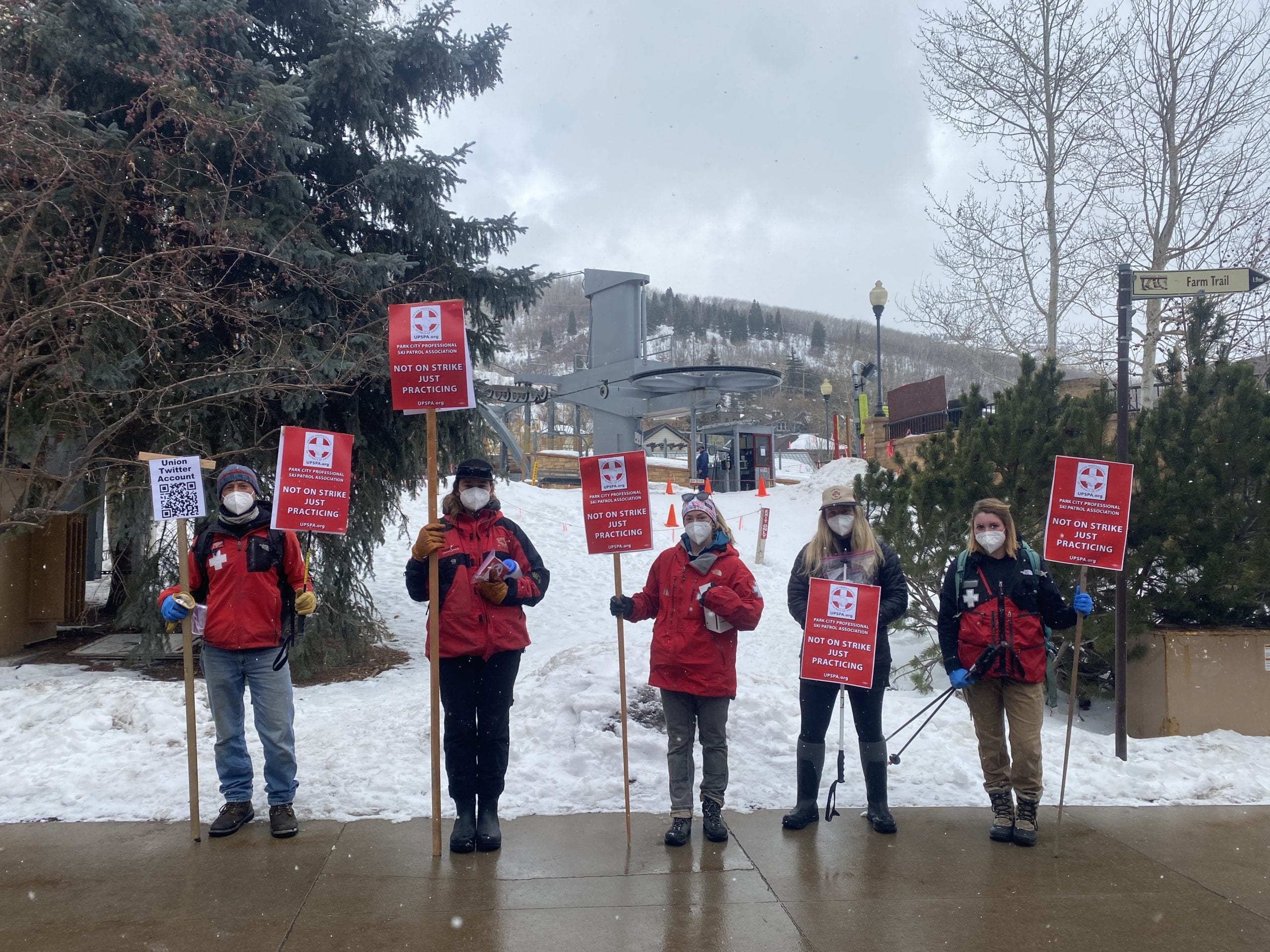 Park City ski patrollers rallying on Historic Park City's Main Street just outside the resort's Town Lift this morning.