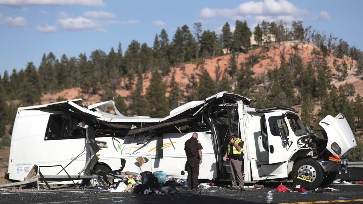 Authorities work the scene of a tour bus crash near Bryce Canyon National Park on Sept. 20, 2019, in Utah. The tour bus that crashed and killed four Chinese tourists near a national park in Utah in 2019 had problems earlier that day with the engine not starting, according to a new documents released Wednesday, March 31, 2021, by U.S. authorities investigating the incident.