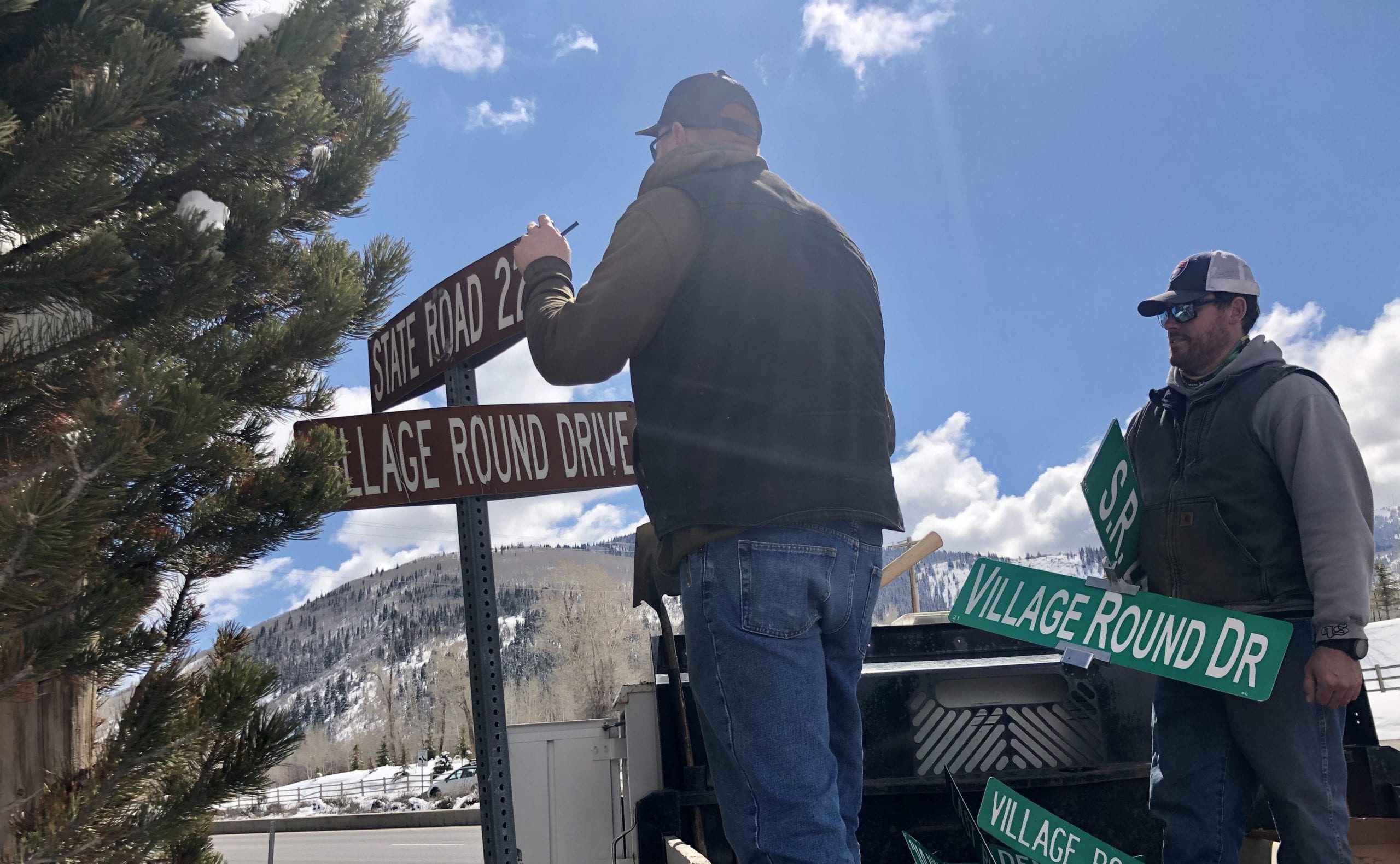 Summit County staff members David Day (right) and Bonner Mitchell (left) keeping the community current.