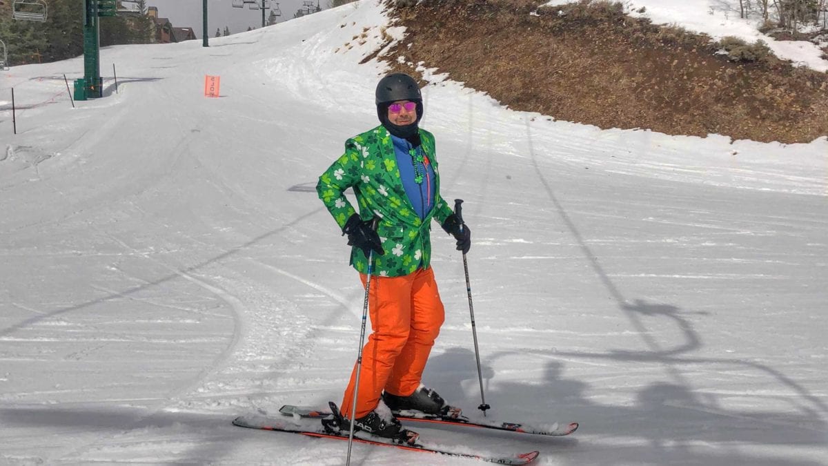 Some leprechauns keep it business casual and ski in blazers and orange pants.