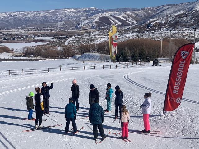 Students learning XC skiing with YSA at the 2002 Olympic venue Soldier Hollow (SOHO) in Midway.
