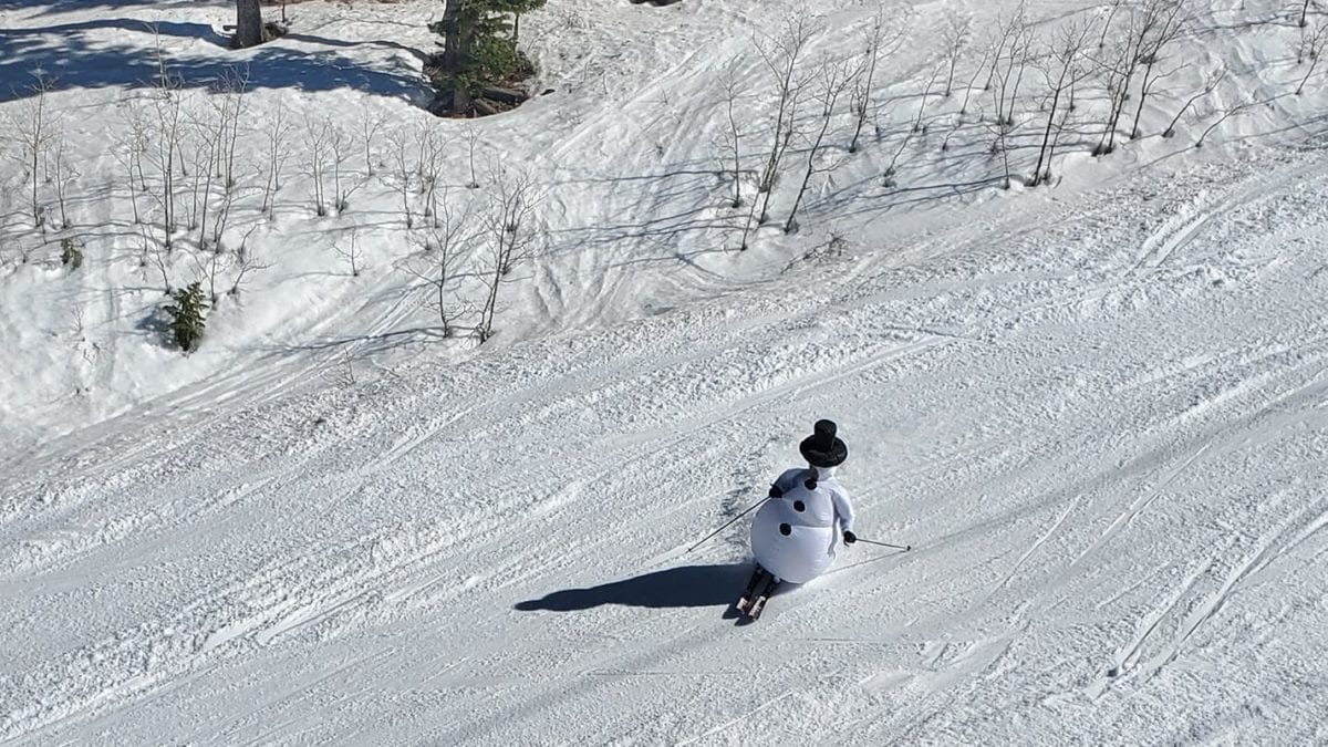 Spring snowman skiing at Deer Valley Resort.