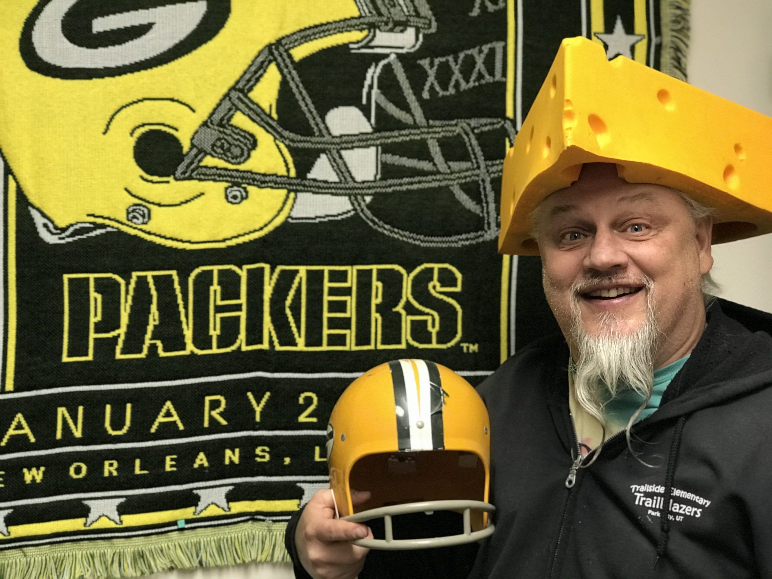 Mr. Meier with his signature cheese-head lucky hat, like the one he wore in his official school picture day photo year after year.