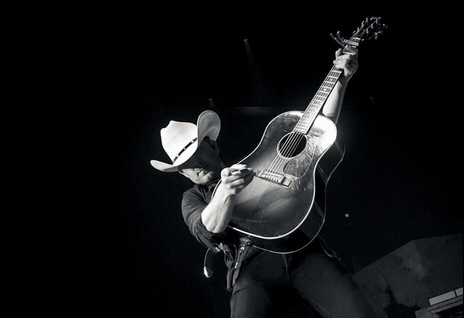 Justin Moore rocking out on his acoustic guitar.