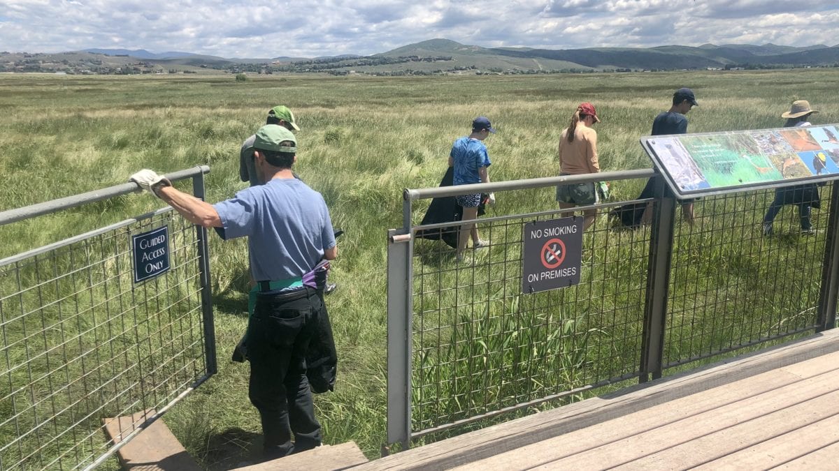 Volunteers getting the privilege of being let through the gates of the Swaner Preserve and Ecocenter.