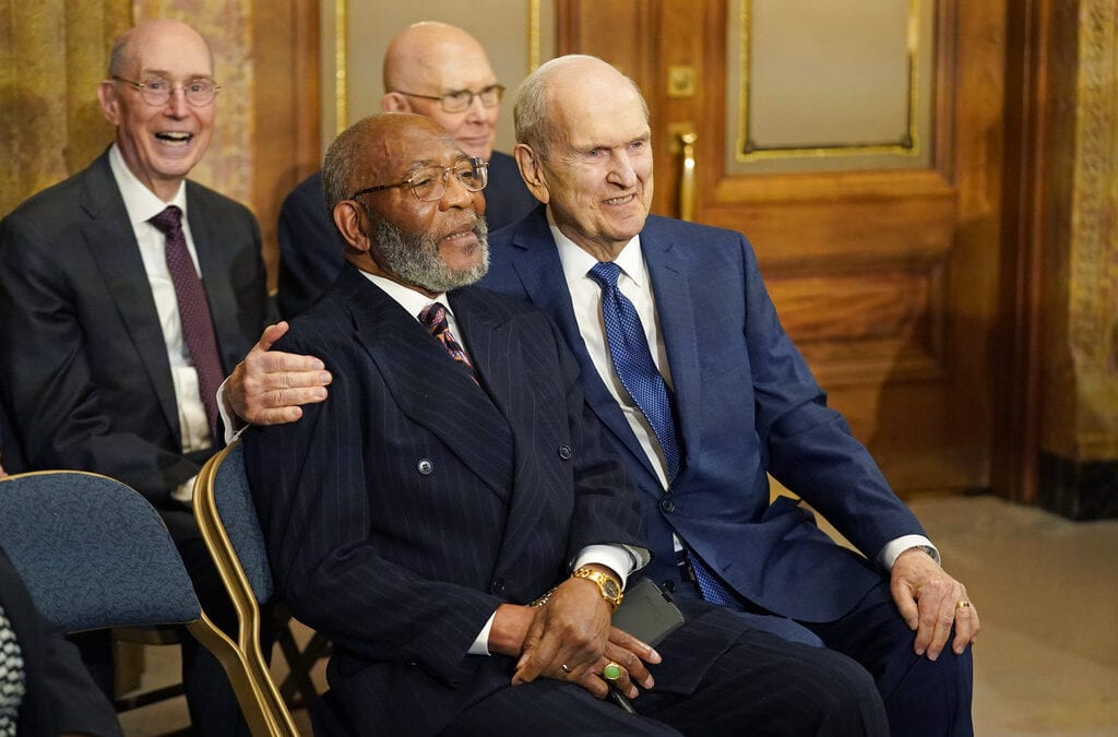 The Rev. Amos C. Brown, front left, and President Russell M. Nelson of The Church of Jesus Christ of Latter-day Saints are shown during a news conference Monday, June 14, 2021, in Salt Lake City. Top leaders from the NAACP and The Church of Jesus Christ of Latter-day Saints announced $9.25 million in new educational and humanitarian projects as they seek to build on an alliance formed in 2018.