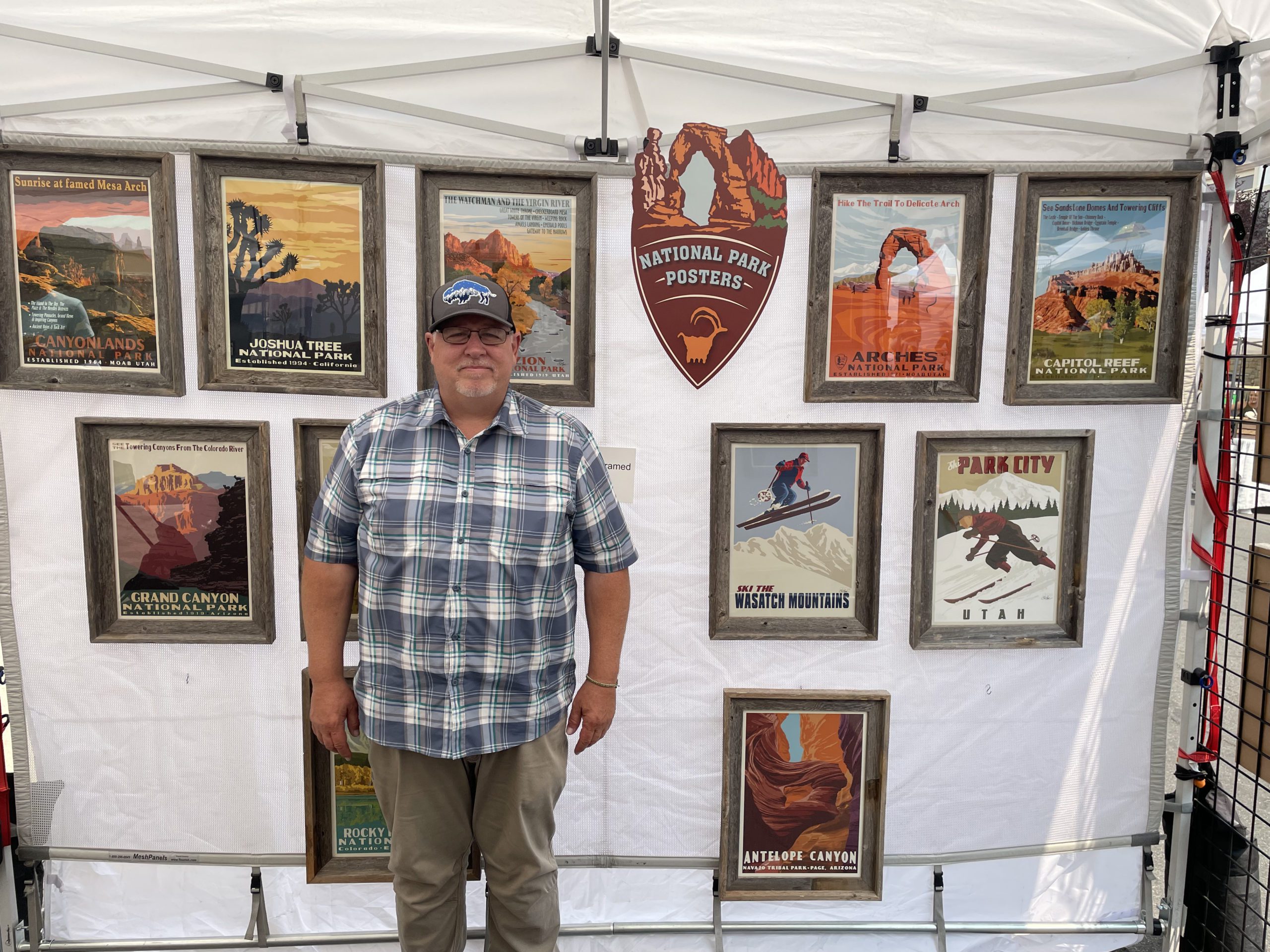 C.D. Cross stands inside his tent at the Park Silly Sunday Market.