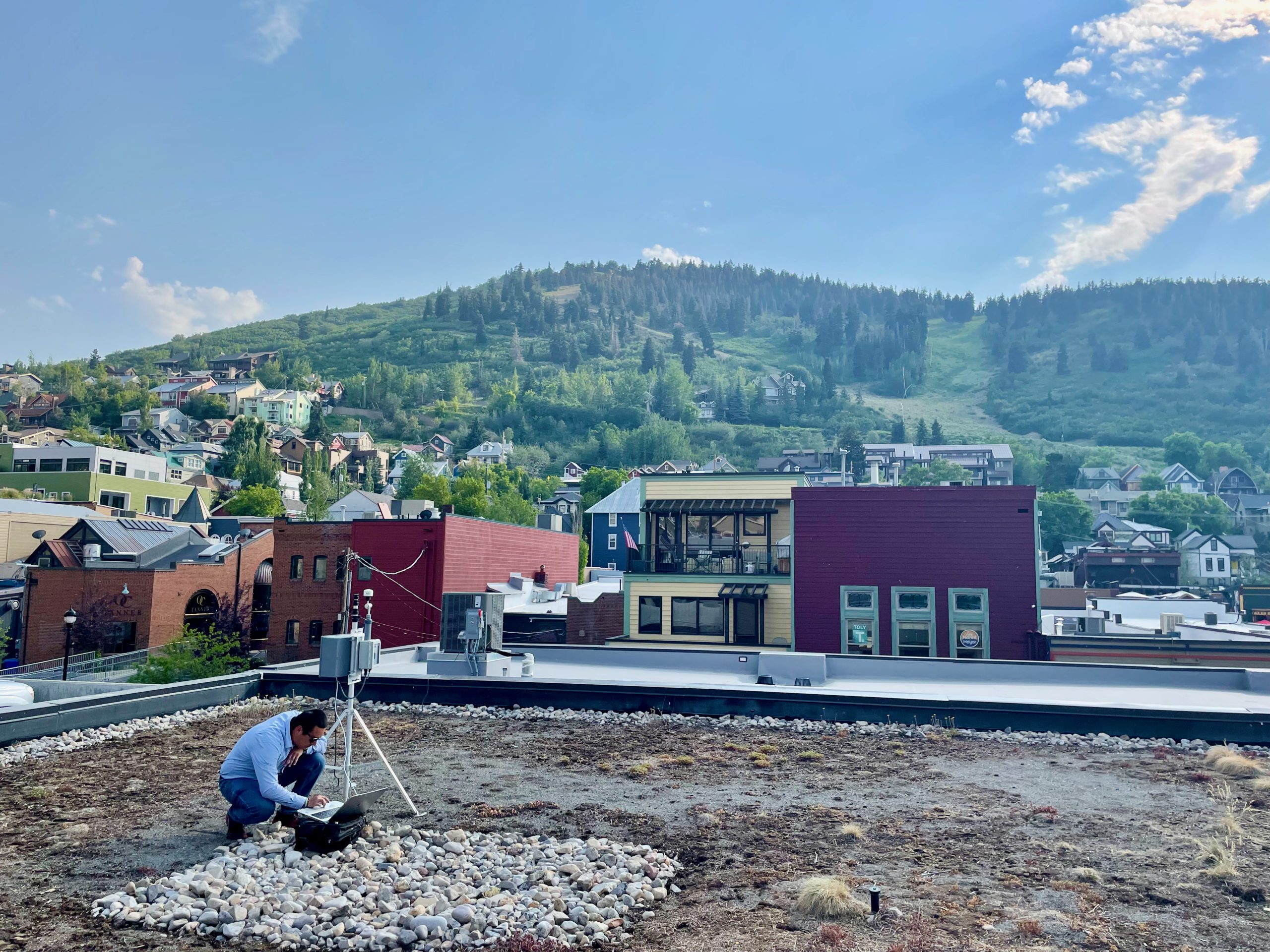 Daniel Mendoza extracts data from an air quality sensor in Old Town.