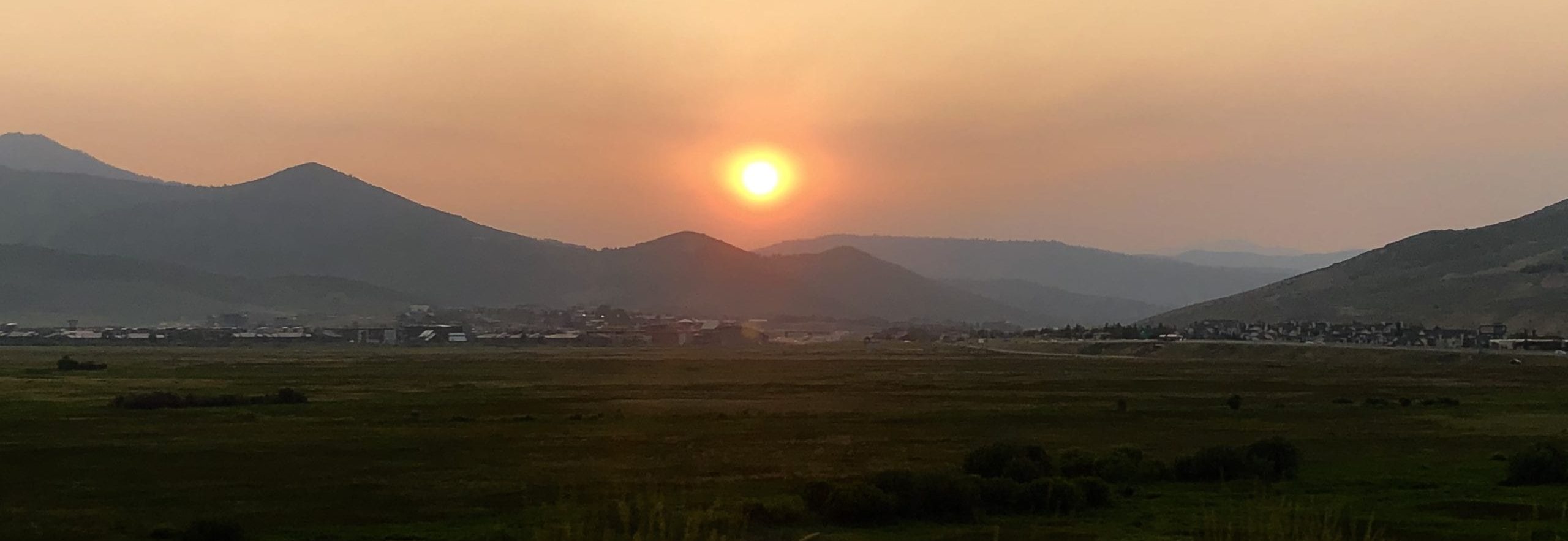 Smoke-tinted sunset over Park City