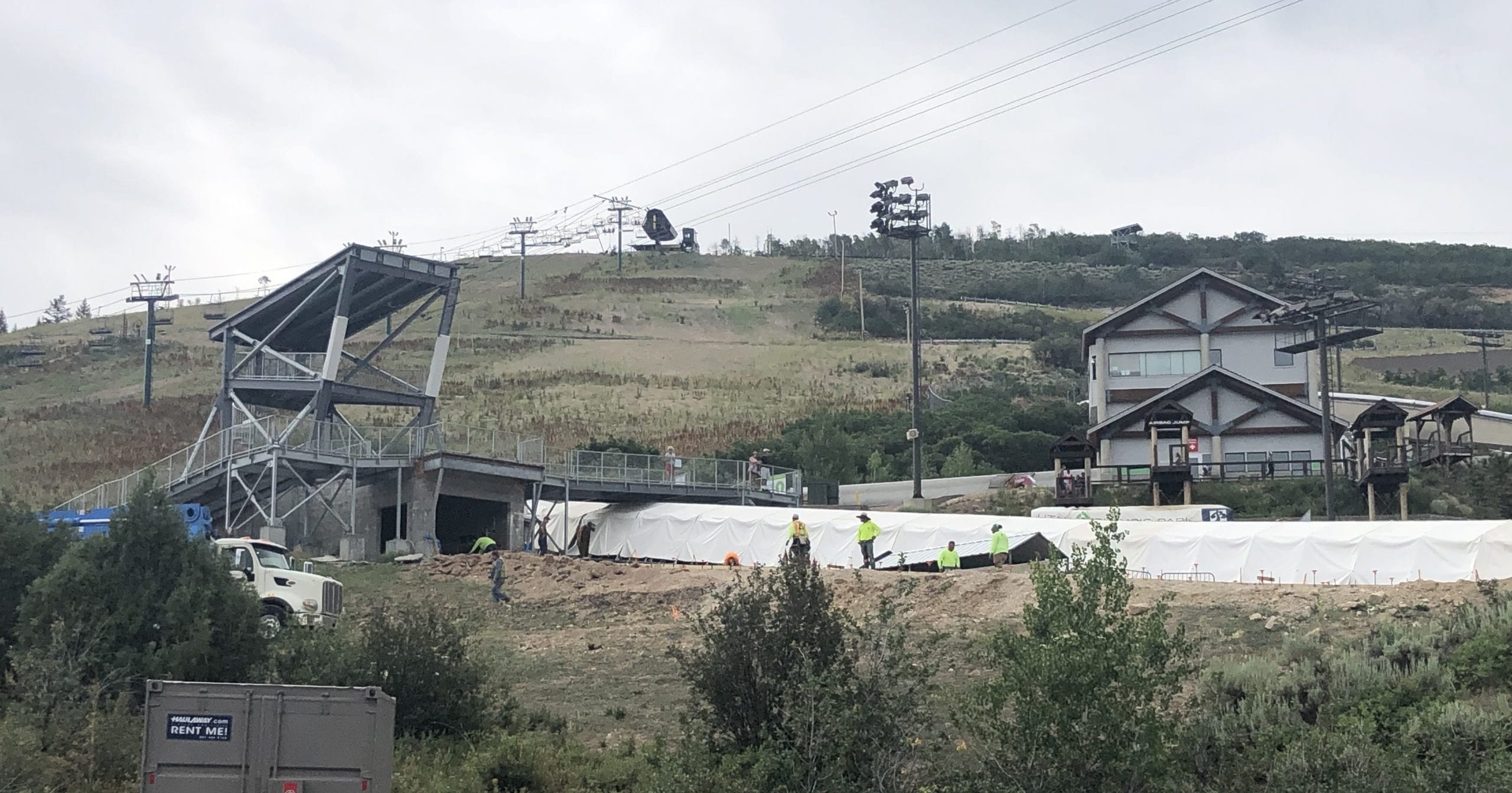 Construction workers putting the final touches on the new Steve Holcomb Bobsled/Skeleton Push Track at the Utah Olympic Park