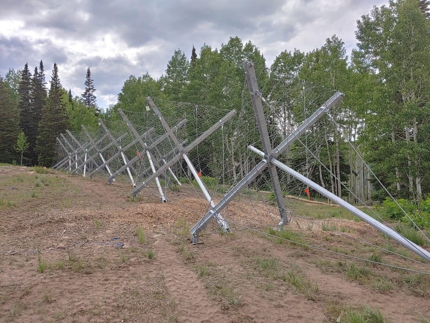 The avalanche fences under construction.