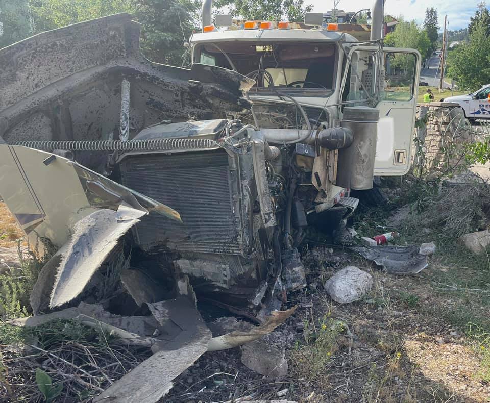 A dump truck coming down Marsac Avenue went through the roundabout hitting two cars.