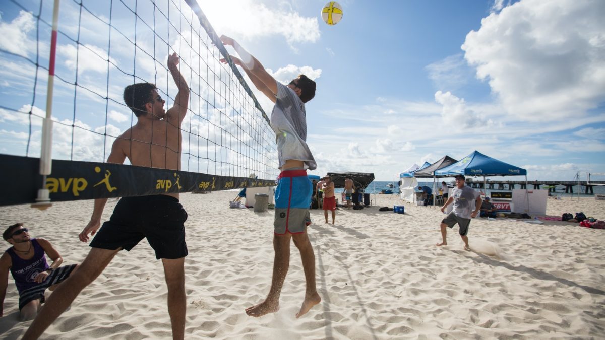 Men's beach volleyball match match-up.