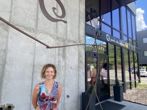 Rhonda Sideris poses in front of Park City Lodging's building in Prospector.