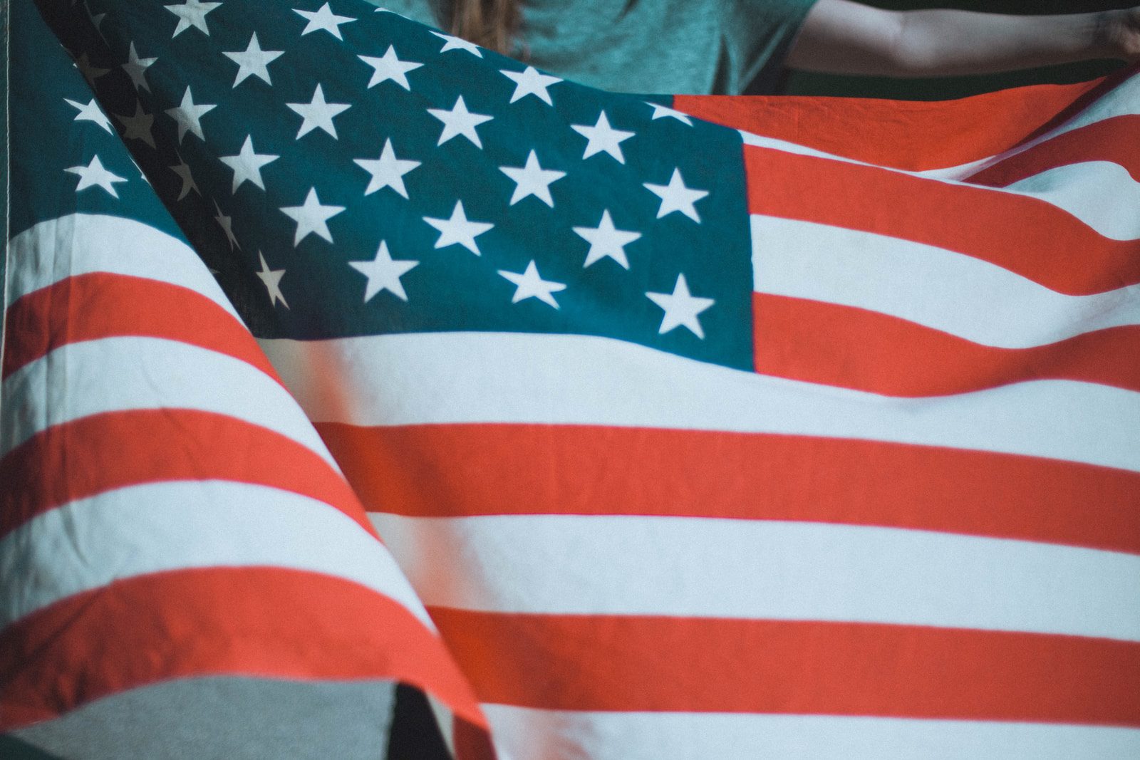 "The NAACP does not agree with that statement and rejects the idea that flying the American flag is a racist message."