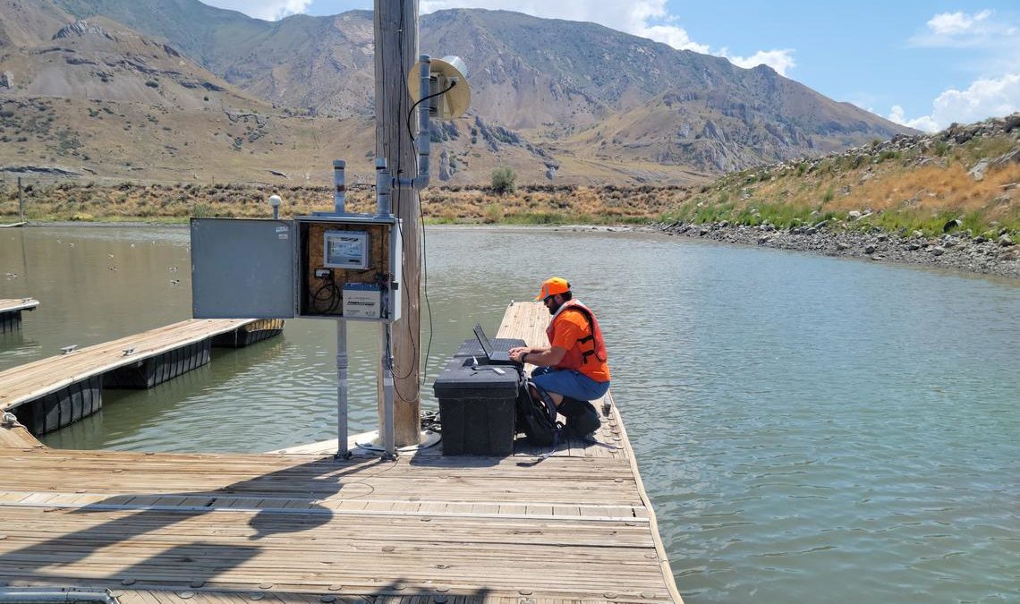 USGS hydrologic technician Travis Gibson confirms Great Salt Lake water levels at the SaltAire gauge.