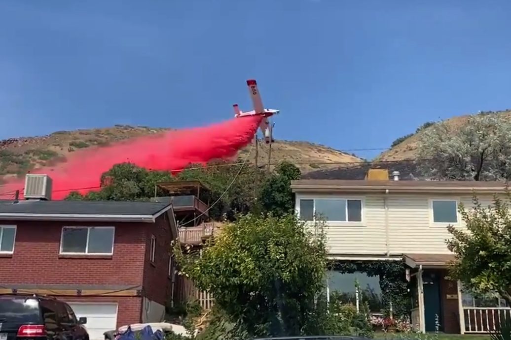 Crews work to extinguish the Millcreek Wildlands Fire in Salt Lake City, Utah.