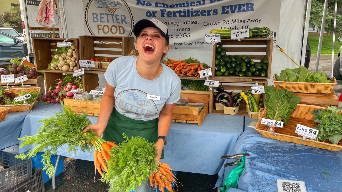 Kailey Foster at the Better Food Farm booth at the Park City Farmer's Market.