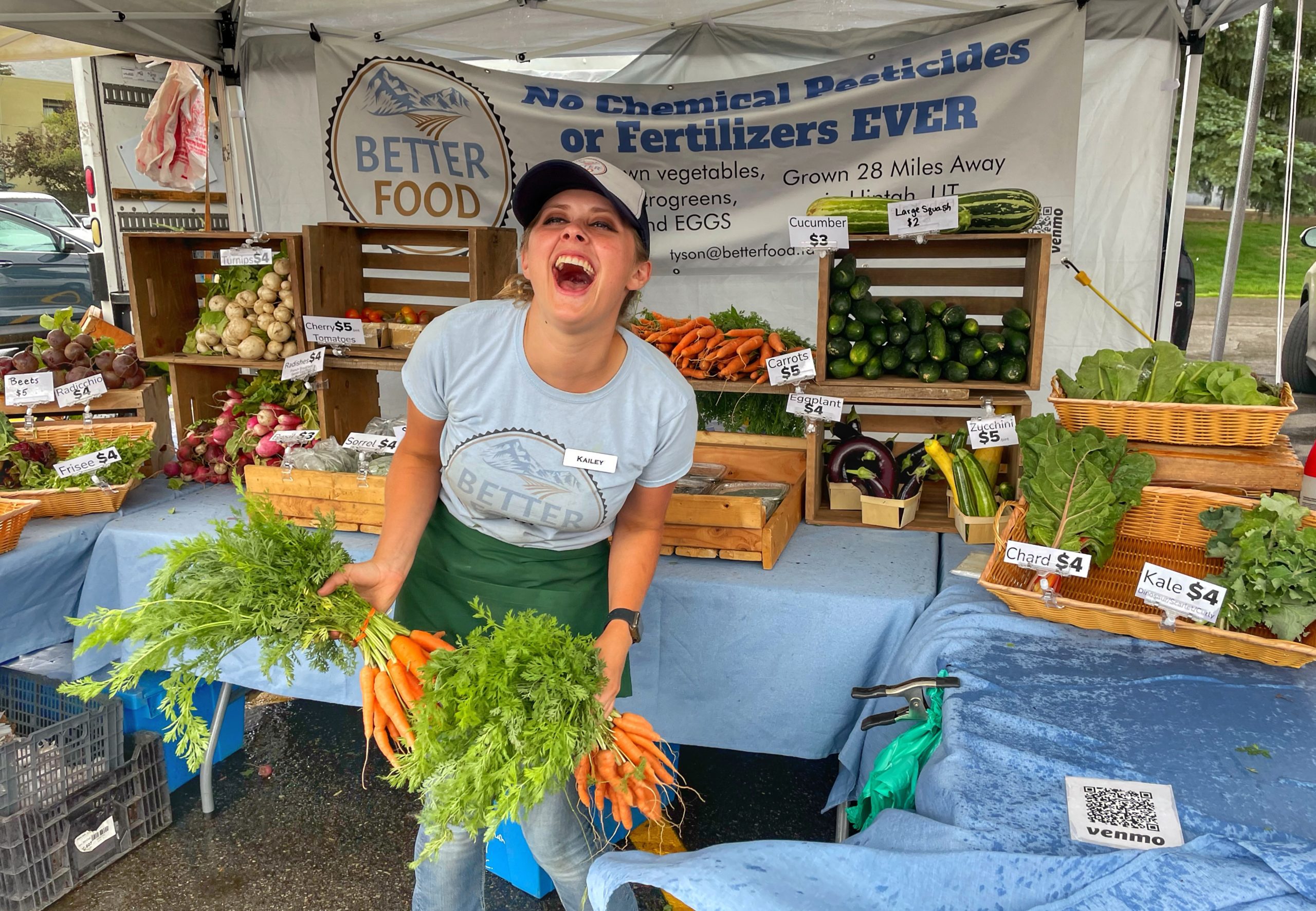 Kailey Foster at the Better Food Farm booth at the Park City Farmer's Market.