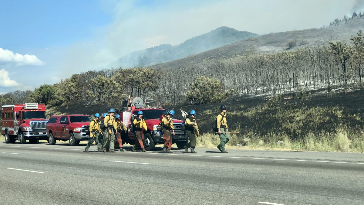 One of multiple crews hiking up the rough terrain to fight the Parley's Canyon fire on Saturday.