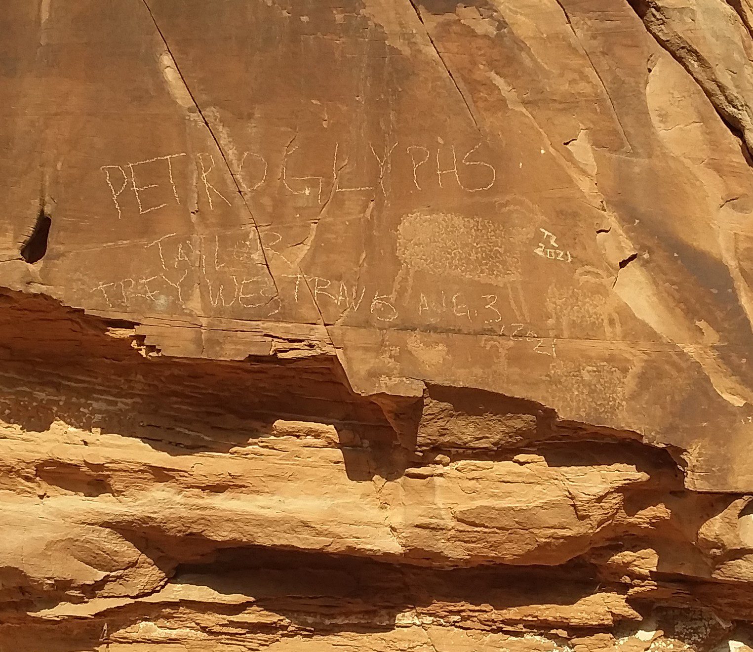 A petroglyph in Mill Creek Canyon that was vandalized earlier in August.