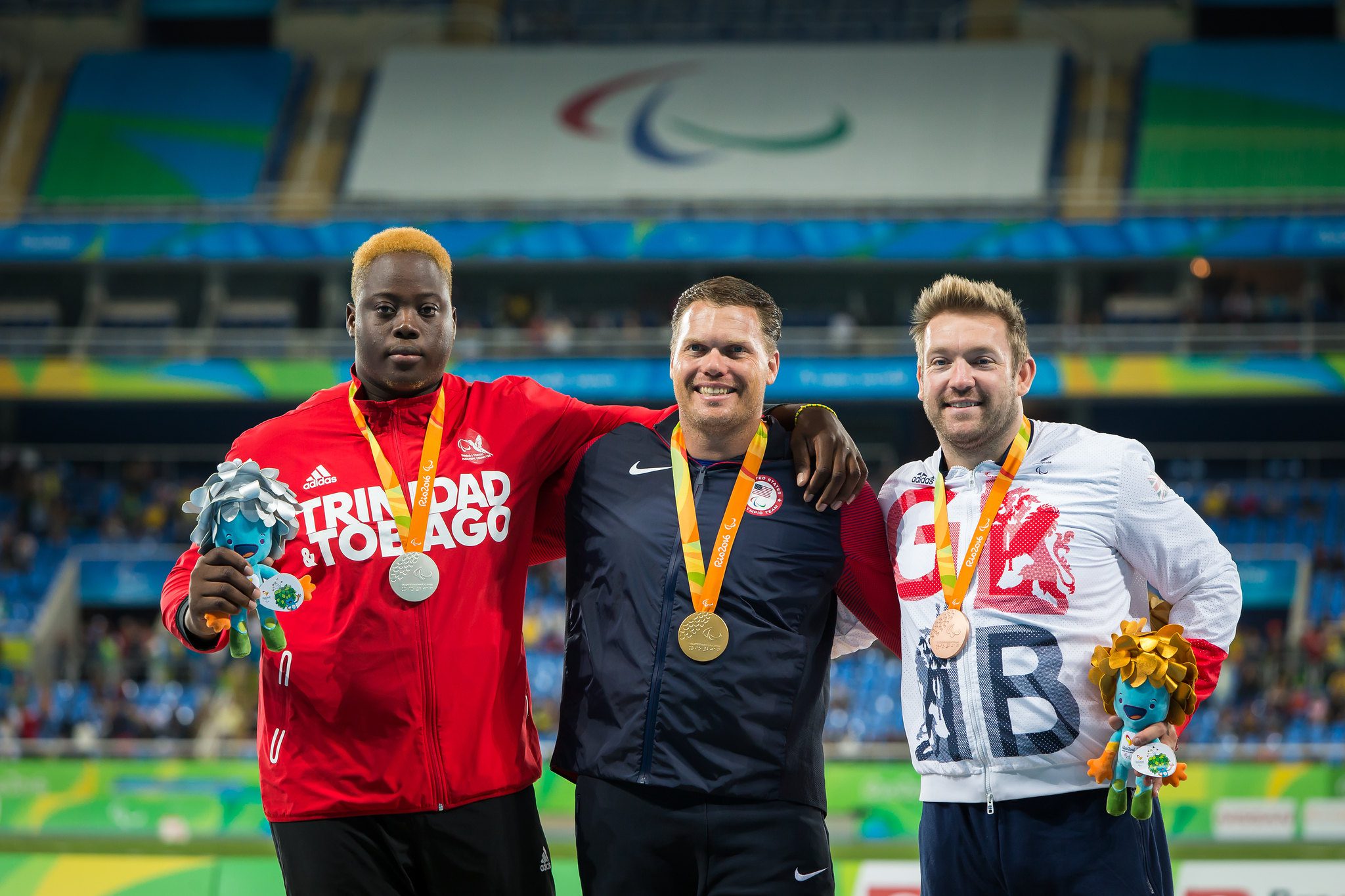 Utah's David Blair (center) winning gold five years ago on the discus in the Rio 2016 Paralympic Games. His result was not able to be repeated in the Tokyo 2020 Games.