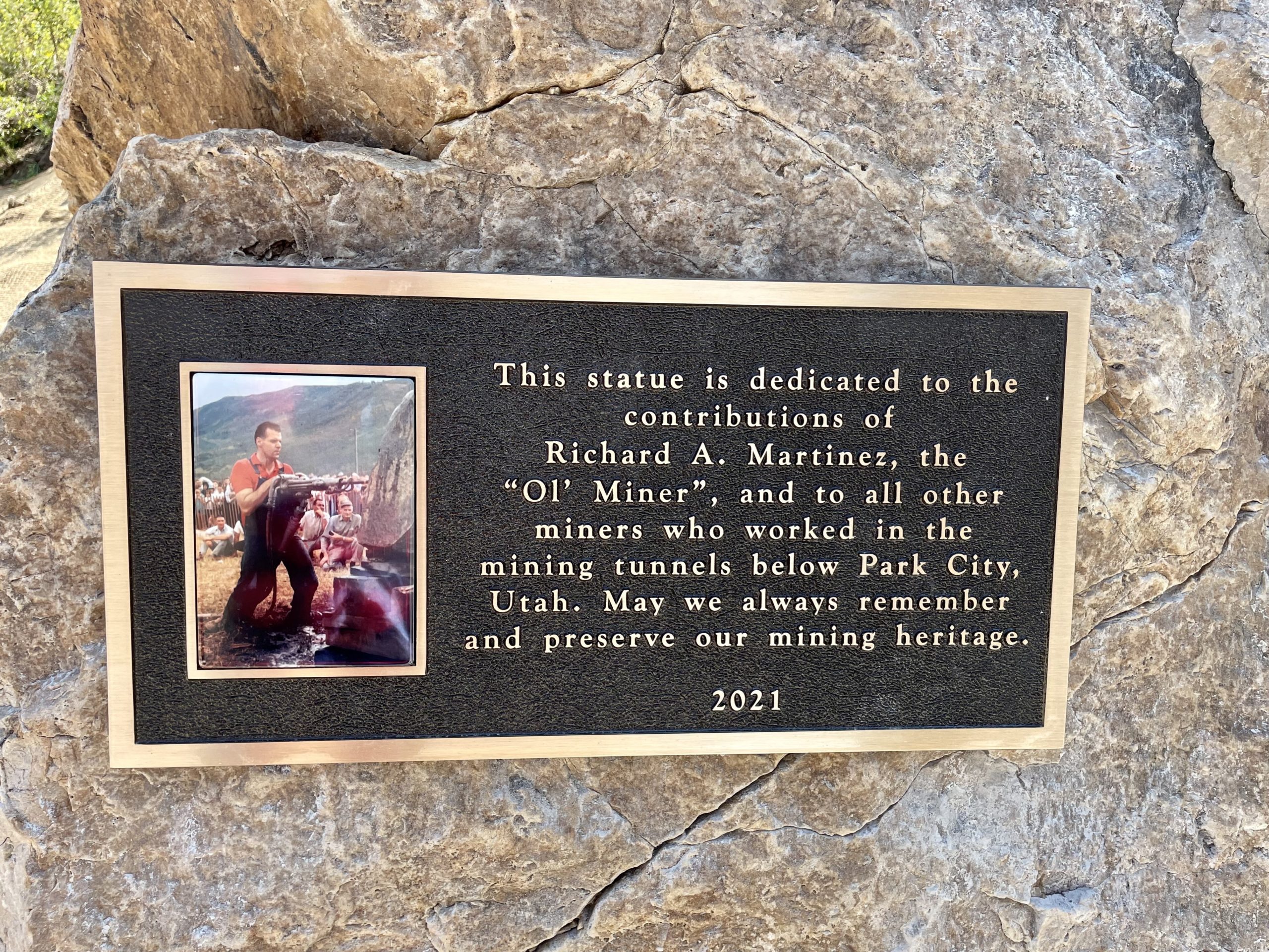 The plaque at the Rich Martinez sculpture.