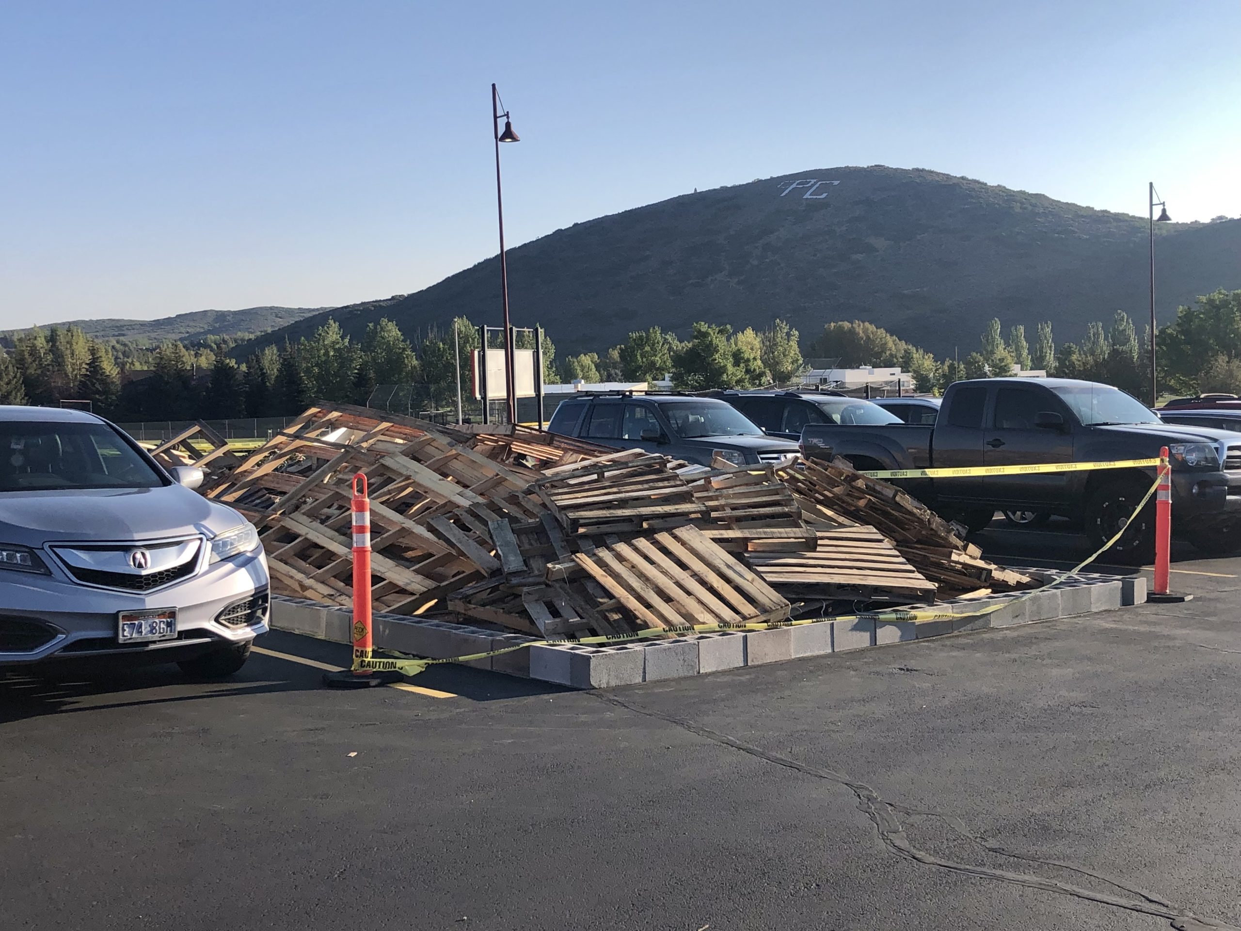 Pile of palettes in preparation for the school-sponsored homecoming bonfire.