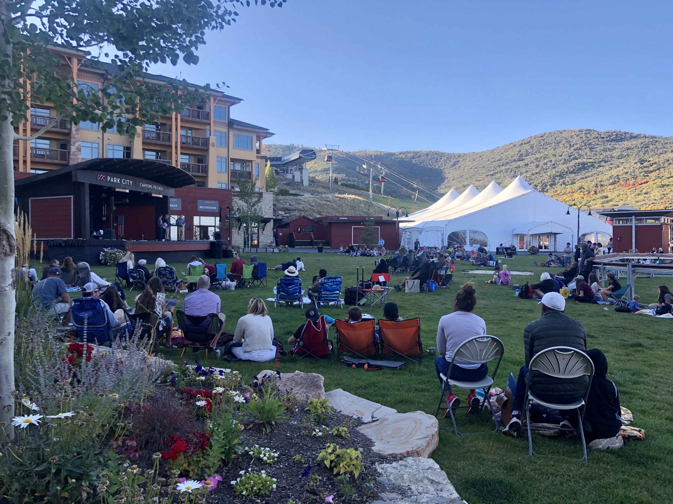 Park City Mountain Resort's Canyon's Village played host to the Youth Sports Alliance's annual Circle of Excellence ceremony. Invited families comprised the audience and on stage were the emcees, (l to r) gold and silver speedskating Olympic medalist Derek Parra, Executive Director of the Youth Sports Alliance Emily Boyle, and eight-time Olympic/Paralympic/Youth Olympic announcer Carl Roepke.