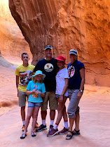 Scott Phillips (center), his wife, Kristi (far right,) and their three children