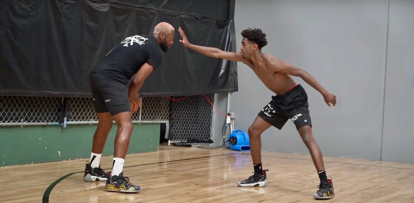 Dwayne Wade and his son Zaire playing 1-on-1 last year.