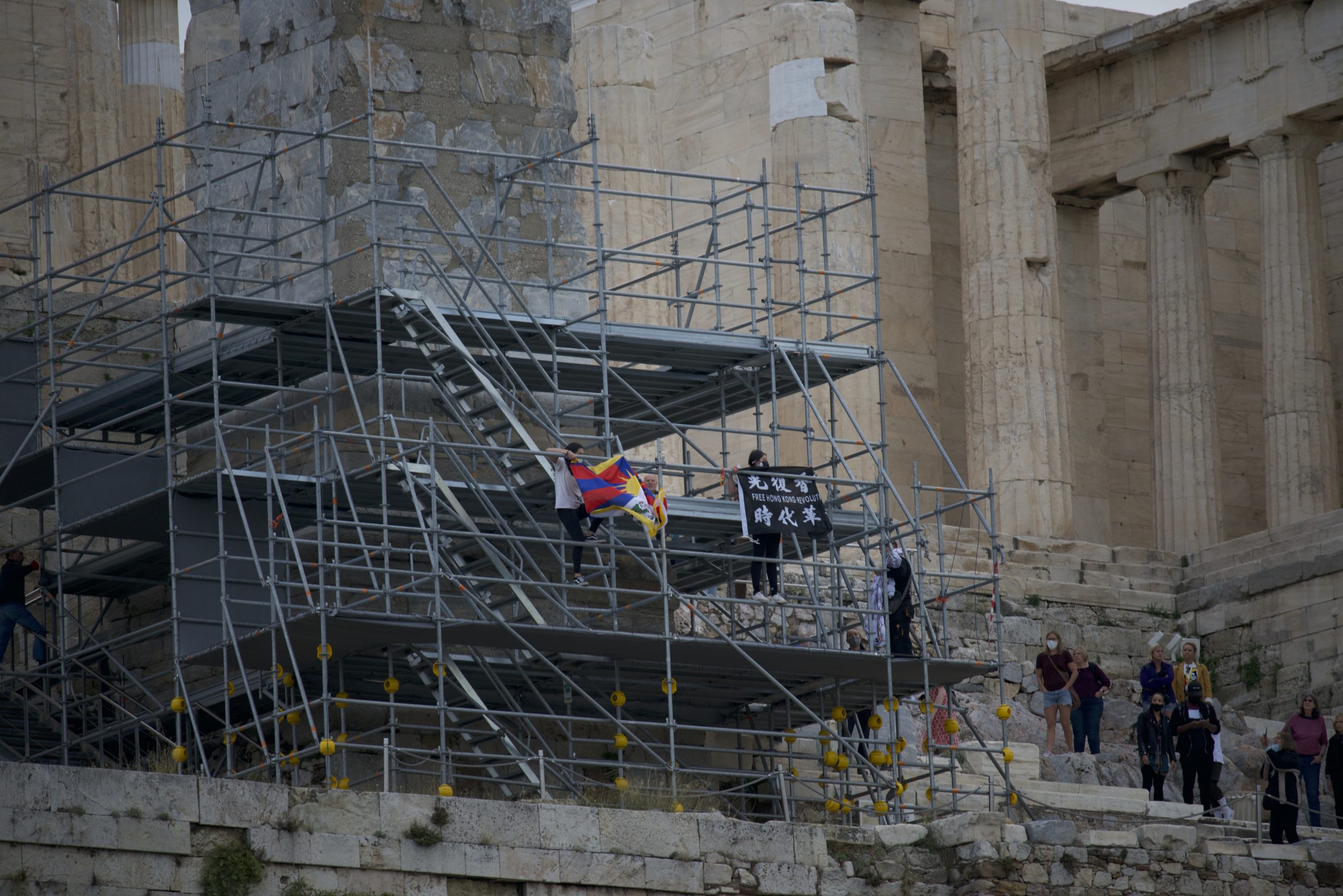 Tibetan and Hongkonger activists staged a protest at the Acropolis in Athens, Greece.