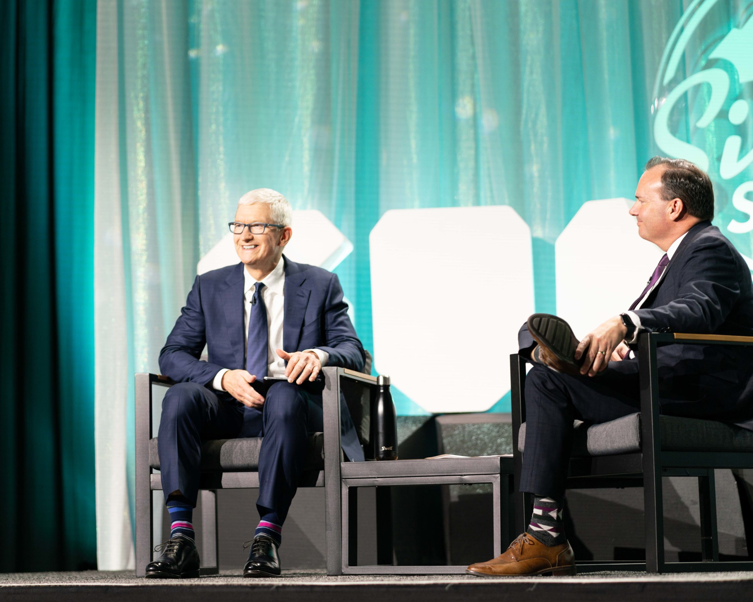 Apple CEO Tim Cook spoke with Sen. Mike Lee at the Silicon Slopes Summit in downtown Salt Lake City on Wednesday.