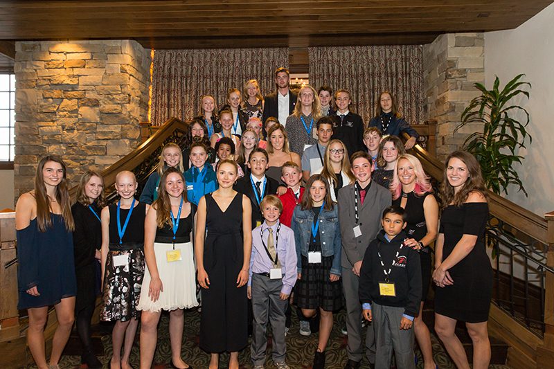 2018 Youth Sports Alliance Jan's Winter Welcome Olympic hopefuls and Olympians including moguls medalist Shannon Bahrke (second from right on bottom row) and nordic ski jumper Abbey Ringquist (far right on bottom row), at the Stein Eriksen Lodge in Deer Valley.