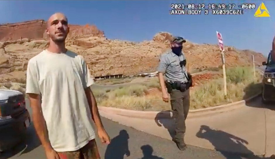 Brian Laundrie talking to a Moab police officer after police pulled over the van he was traveling in with his girlfriend, Gabrielle "Gabby" Petito, near the entrance to Arches National Park.