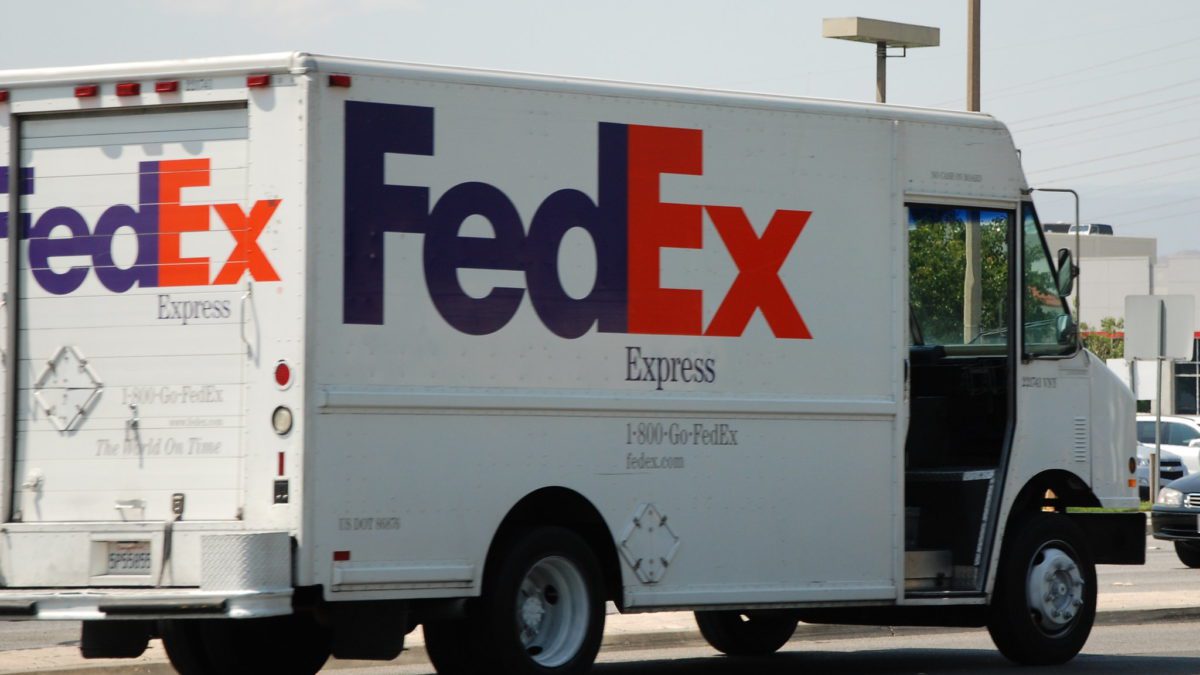 FedEx delivery truck has trouble negotiating the twists and turns of the Utah Olympic Park Rd.
