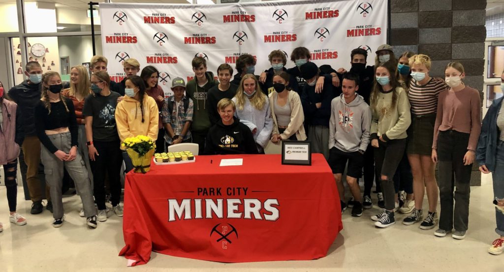 Wes Campbell with his cross country running teammates.