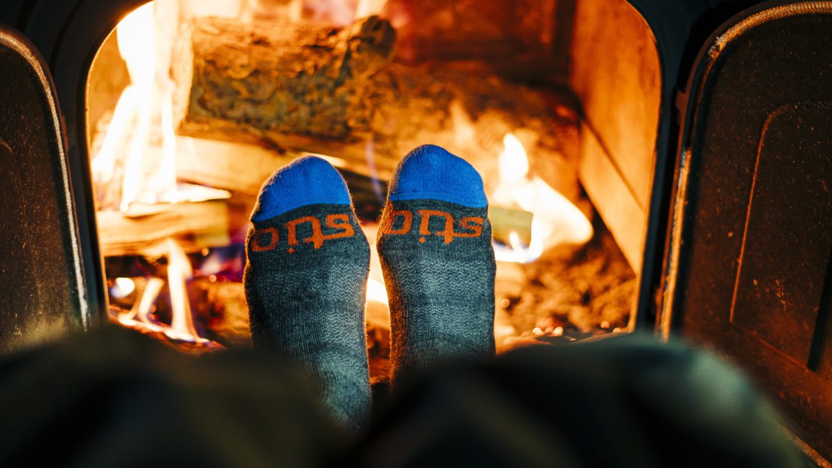 All-Mountain Stio Ski Socks getting toasty at the Jackal Hut, a 10th Mountain Division Hut in Red Cliff, Colorado.