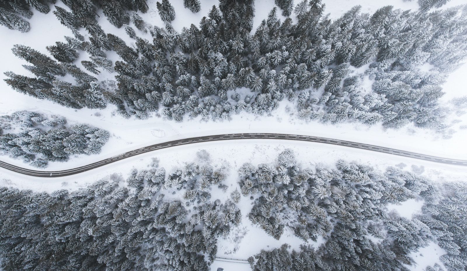 At just the begining of a predicted snowstorm, UDOT is requiring traction devices in many areas of Norther Utah.