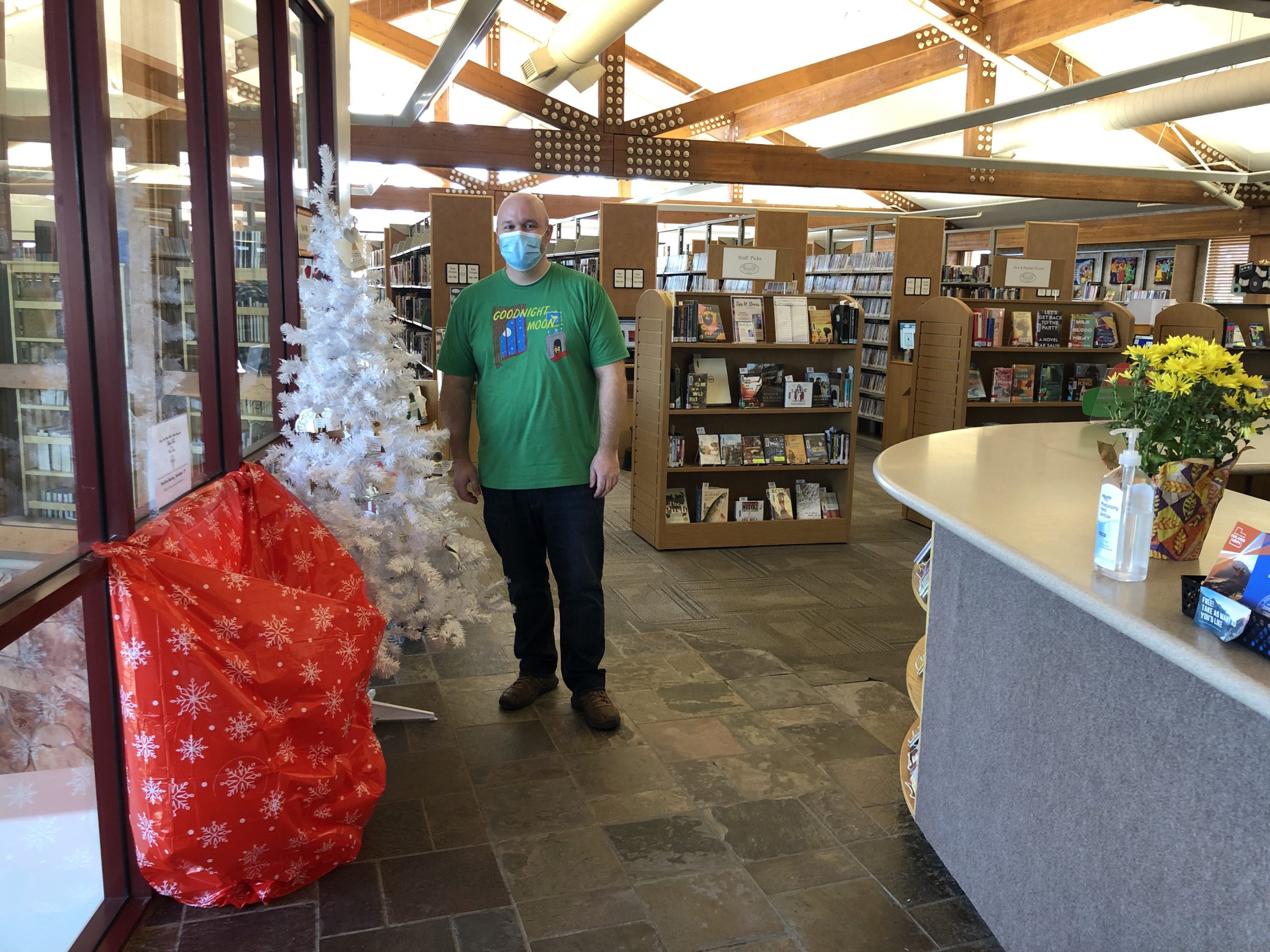 The Summit County Library's Angel Tree with Director Dan Compton wearing what else but a "Goodnight Moon" t-shirt.