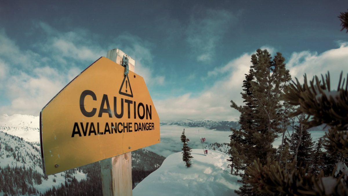 Caution avalanche danger signage during winter.
