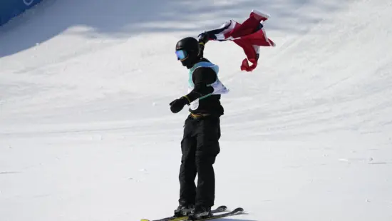 Birk Ruud of Norway celebrates after a "nice" run at the men's freestyle skiing big air finals.